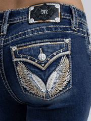 Miss Me M3080B89L Womens Mid Rise Slim Fit Bootcut Jean Medium Blue back close up. If you need any assistance with this item or the purchase of this item please call us at five six one seven four eight eight eight zero one Monday through Saturday 10:00a.m EST to 8:00 p.m EST