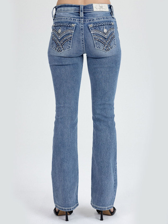 Miss Me M3444B171 Womens Mid Rise Boot Jean Medium Blue close up. If you need any assistance with this item or the purchase of this item please call us at five six one seven four eight eight eight zero one Monday through Saturday 10:00a.m EST to 8:00 p.m EST