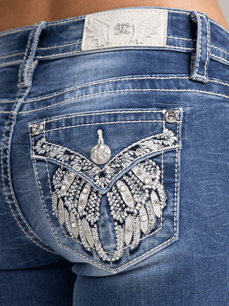 Miss Me M5082B229V Womens Mid Rise Bootcut Jeans Medium Blue back close up. If you need any assistance with this item or the purchase of this item please call us at five six one seven four eight eight eight zero one Monday through Saturday 10:00a.m EST to 8:00 p.m EST