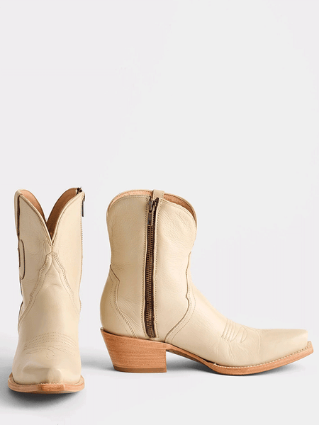 Lucchese M6073 Womens APRIL Cactus Side Zip Bootie Cream front and zipper side view. If you need any assistance with this item or the purchase of this item please call us at five six one seven four eight eight eight zero one Monday through Saturday 10:00a.m EST to 8:00 p.m EST