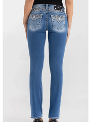 Miss Me M9498BL Womens Solene Fleur Mid Rise Bootcut Jean Medium Blue back view. If you need any assistance with this item or the purchase of this item please call us at five six one seven four eight eight eight zero one Monday through Saturday 10:00a.m EST to 8:00 p.m EST