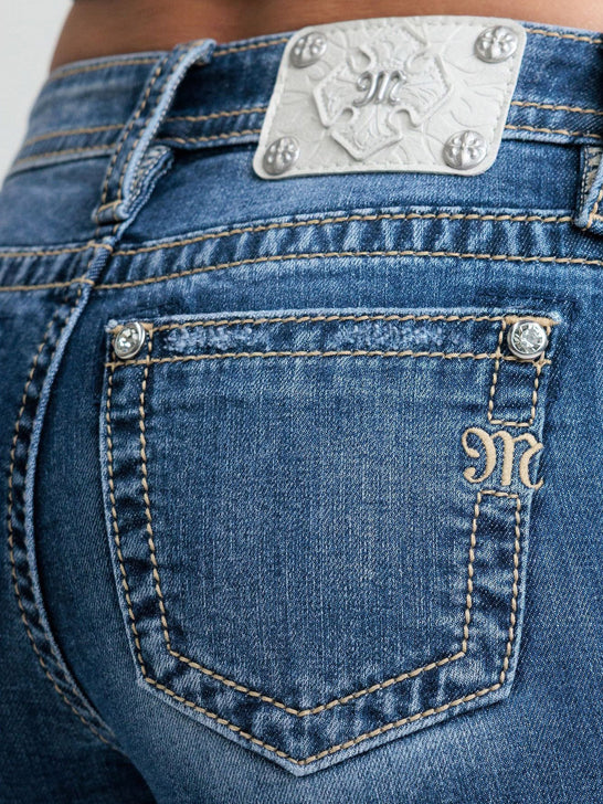 Miss Me M9653B2 Womens Mid Rise Bootcut Jeans Medium Blue close up. If you need any assistance with this item or the purchase of this item please call us at five six one seven four eight eight eight zero one Monday through Saturday 10:00a.m EST to 8:00 p.m EST