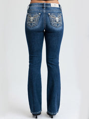 Miss Me M9707BL Womens Mid Rise Bootcut Jean Dark Blue back view. If you need any assistance with this item or the purchase of this item please call us at five six one seven four eight eight eight zero one Monday through Saturday 10:00a.m EST to 8:00 p.m EST