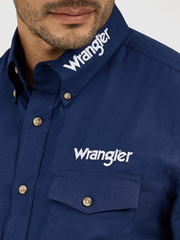 Wrangler MP2327N Mens Logo Long Sleeve Button Down Shirt Navy front close up. If you need any assistance with this item or the purchase of this item please call us at five six one seven four eight eight eight zero one Monday through Saturday 10:00a.m EST to 8:00 p.m EST