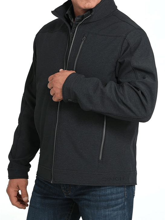 Cinch MWJ1539006 Mens Conceal Carry Bonded Jacket Black side view. If you need any assistance with this item or the purchase of this item please call us at five six one seven four eight eight eight zero one Monday through Saturday 10:00a.m EST to 8:00 p.m EST