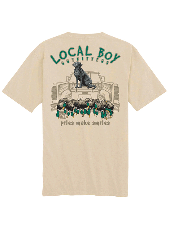 Local Boy Outfitters L1000641-LAT Mens Piles Make Smiles Short Sleeve Tee Latte back view. If you need any assistance with this item or the purchase of this item please call us at five six one seven four eight eight eight zero one Monday through Saturday 10:00a.m EST to 8:00 p.m EST
