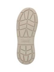 A close-up of a brown shoe sole with a wavy tread pattern and the brand name XTRATUF embossed on the side, set against a light gray background. If you need any assistance with this item or the purchase of this item please call us at five six one seven four eight eight eight zero one Monday through Saturday 10:00a.m EST to 8:00 p.m EST