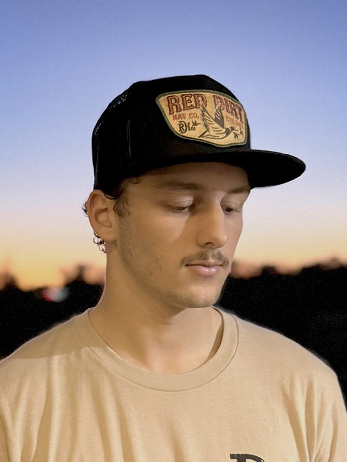 Red Dirt RDHC-488 FLY SOUTH Trucker Cap Black front view. If you need any assistance with this item or the purchase of this item please call us at five six one seven four eight eight eight zero one Monday through Saturday 10:00a.m EST to 8:00 p.m EST
