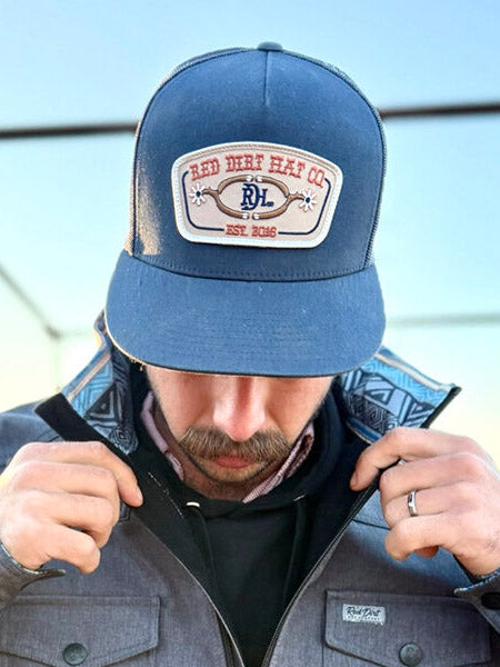 Red Dirt RDHC-584 GIG 'UM Trucker Cap Navy on model. If you need any assistance with this item or the purchase of this item please call us at five six one seven four eight eight eight zero one Monday through Saturday 10:00a.m EST to 8:00 p.m EST