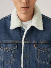 Levis 163650286 Mens Type III Sherpa Trucker Jacket Ark Stonewash Sherpa Blue close up. If you need any assistance with this item or the purchase of this item please call us at five six one seven four eight eight eight zero one Monday through Saturday 10:00a.m EST to 8:00 p.m EST