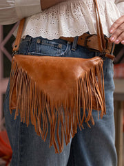 Bed Stu A694264-TADD-X Womens Silverrock Crossbody Handbag Tan front view on model. If you need any assistance with this item or the purchase of this item please call us at five six one seven four eight eight eight zero one Monday through Saturday 10:00a.m EST to 8:00 p.m EST