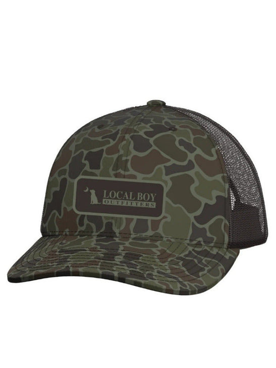 Local Boy Outfitters L3000790-LCO Logo Patch Trucker Hat Localflage OD front view. If you need any assistance with this item or the purchase of this item please call us at five six one seven four eight eight eight zero one Monday through Saturday 10:00a.m EST to 8:00 p.m EST