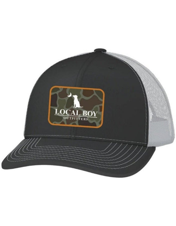 Local Boy Outfitters L3000783-CHW OD Pocket Patch Trucker Hat Charcoal White front view. If you need any assistance with this item or the purchase of this item please call us at five six one seven four eight eight eight zero one Monday through Saturday 10:00a.m EST to 8:00 p.m EST