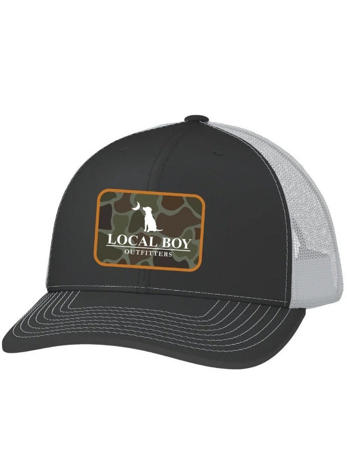 Local Boy Outfitters L3000783-CHW OD Pocket Patch Trucker Hat Charcoal White front view. If you need any assistance with this item or the purchase of this item please call us at five six one seven four eight eight eight zero one Monday through Saturday 10:00a.m EST to 8:00 p.m EST