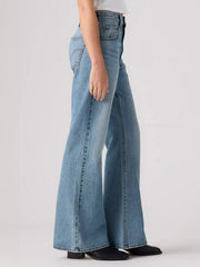 Levi's 0081R0003 Womens Cinch Flare Jeans Handled That Medium Wash side view. If you need any assistance with this item or the purchase of this item please call us at five six one seven four eight eight eight zero one Monday through Saturday 10:00a.m EST to 8:00 p.m EST
