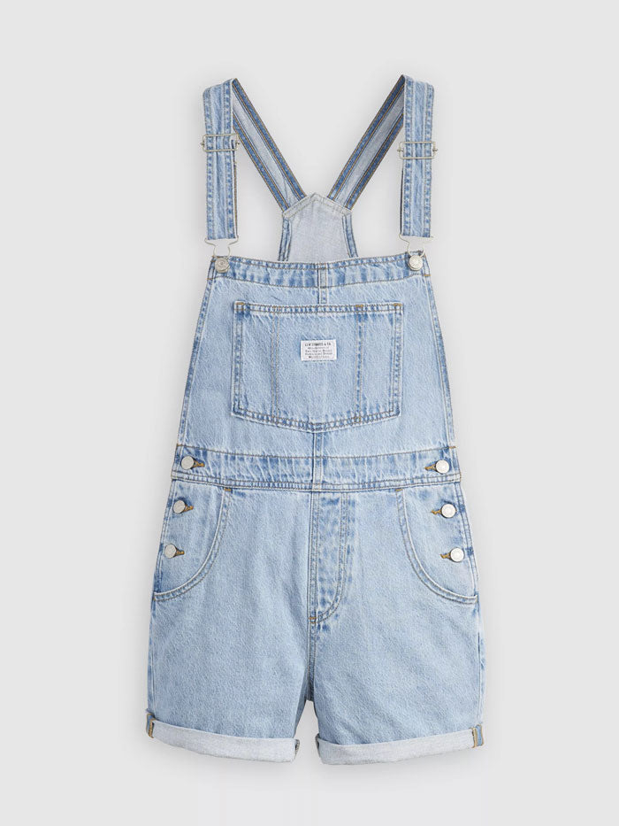 Levi's 523330059 Womens Vintage Shortalls Light Blue front view on model. If you need any assistance with this item or the purchase of this item please call us at five six one seven four eight eight eight zero one Monday through Saturday 10:00a.m EST to 8:00 p.m EST
