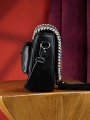 Wrangler WG2212-8136BK Womens Southwestern Print Saddle Bag Black side view. If you need any assistance with this item or the purchase of this item please call us at five six one seven four eight eight eight zero one Monday through Saturday 10:00a.m EST to 8:00 p.m EST