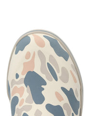 Close-up of the toe area of a slip-on shoe featuring an abstract camouflage pattern in slate blue, dusty pink, and light gray on a cream base, with a light gray sole edge. If you need any assistance with this item or the purchase of this item please call us at five six one seven four eight eight eight zero one Monday through Saturday 10:00a.m EST to 8:00 p.m EST
