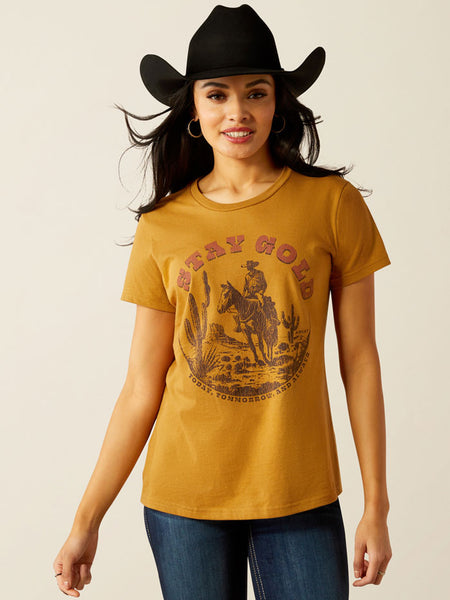 Ariat 10054035 Womens Stay Gold T-Shirt Harvest Gold front view. If you need any assistance with this item or the purchase of this item please call us at five six one seven four eight eight eight zero one Monday through Saturday 10:00a.m EST to 8:00 p.m EST