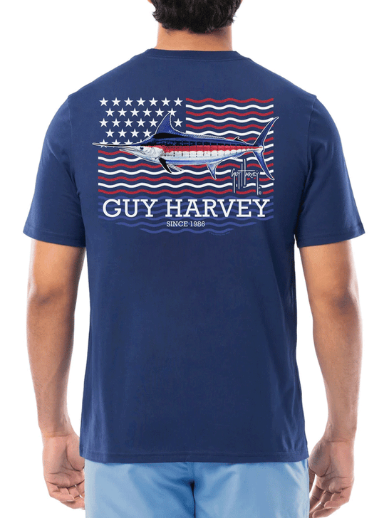 Guy Harvey GHV56000-NBL Mens Liberty Marlin Short Sleeve T-Shirt Navy Blue back. If you need any assistance with this item or the purchase of this item please call us at five six one seven four eight eight eight zero one Monday through Saturday 10:00a.m EST to 8:00 p.m EST