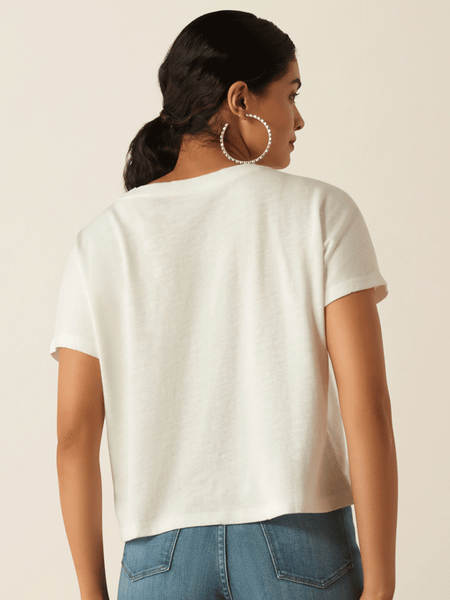 Ariat 10055139 Womens Cowboy T-Shirt Cloud Dancer back view. If you need any assistance with this item or the purchase of this item please call us at five six one seven four eight eight eight zero one Monday through Saturday 10:00a.m EST to 8:00 p.m EST