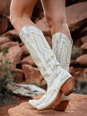 Ariat 10043268 Womens Casanova Western Boot Blanco side view on model outdoor. If you need any assistance with this item or the purchase of this item please call us at five six one seven four eight eight eight zero one Monday through Saturday 10:00a.m EST to 8:00 p.m EST