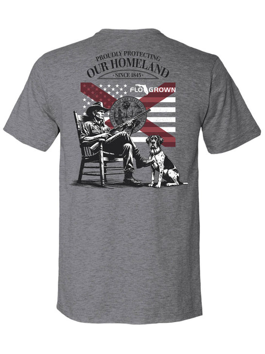 FloGrown FGM-1848 Mens Short Sleeve Proudly Protecting Homeland Tee Grey back view. If you need any assistance with this item or the purchase of this item please call us at five six one seven four eight eight eight zero one Monday through Saturday 10:00a.m EST to 8:00 p.m EST