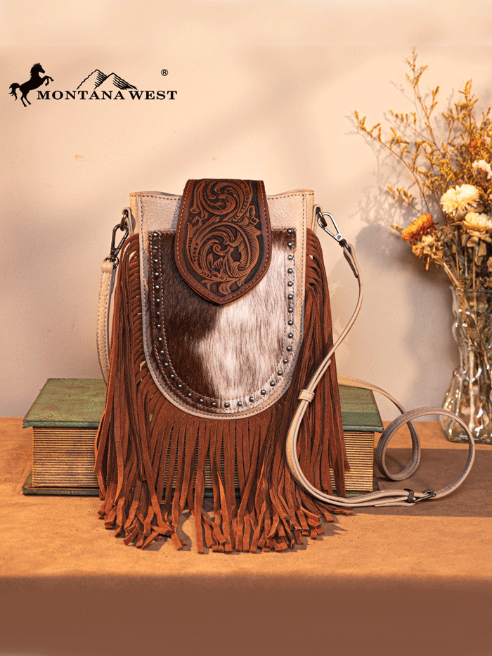 Trinity Ranch TR180-8360TN Womens Genuine Hair On Cowhide Tooled Fringe Crossbody Bag Tan front view. If you need any assistance with this item or the purchase of this item please call us at five six one seven four eight eight eight zero one Monday through Saturday 10:00a.m EST to 8:00 p.m EST


