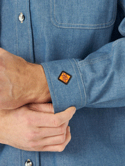 Wrangler FR3W01B Mens Flame Resistant Long Sleeve Work Shirt Blue Chambray cuff close up. If you need any assistance with this item or the purchase of this item please call us at five six one seven four eight eight eight zero one Monday through Saturday 10:00a.m EST to 8:00 p.m EST