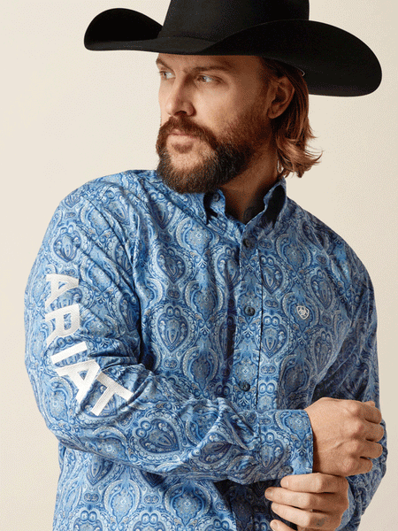 Ariat 10052627 Mens Team Kellan Fitted Shirt Blue arm view. If you need any assistance with this item or the purchase of this item please call us at five six one seven four eight eight eight zero one Monday through Saturday 10:00a.m EST to 8:00 p.m EST