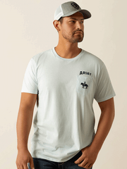 Ariat 10058882 Mens Echo Valley Pocket T-Shirt Quiet Ride Light Blue front view. If you need any assistance with this item or the purchase of this item please call us at five six one seven four eight eight eight zero one Monday through Saturday 10:00a.m EST to 8:00 p.m EST