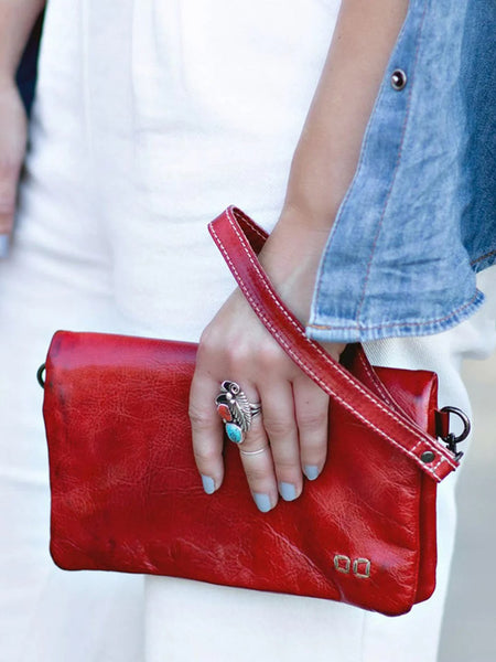 Bed Stu A621040-RDRS-X Womens Cadence 3 In 1 Handbag Red Rustic front view on model. If you need any assistance with this item or the purchase of this item please call us at five six one seven four eight eight eight zero one Monday through Saturday 10:00a.m EST to 8:00 p.m EST
