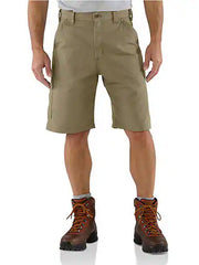 Carhartt B147-DKH Mens Loose Fit Canvas Utility Work Short Dark Khaki front view. If you need any assistance with this item or the purchase of this item please call us at five six one seven four eight eight eight zero one Monday through Saturday 10:00a.m EST to 8:00 p.m EST