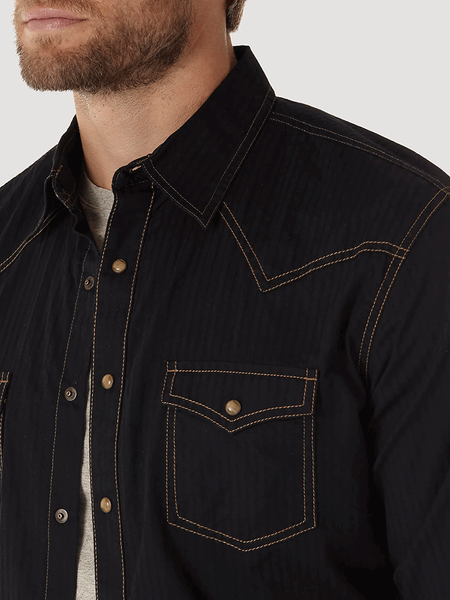 Wrangler MVR532X Mens Retro Western Snap Solid Dobby Shirt Black pocket and collar close up view. If you need any assistance with this item or the purchase of this item please call us at five six one seven four eight eight eight zero one Monday through Saturday 10:00a.m EST to 8:00 p.m EST