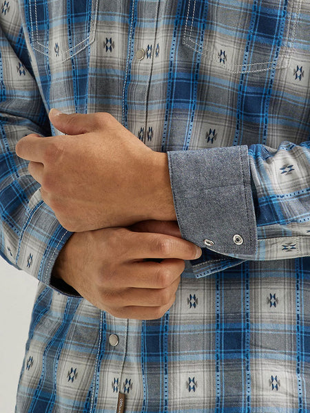 Wrangler 112338151 Mens Retro Long Sleeve Shirt Blue Geo Overprint cuff close up. If you need any assistance with this item or the purchase of this item please call us at five six one seven four eight eight eight zero one Monday through Saturday 10:00a.m EST to 8:00 p.m EST