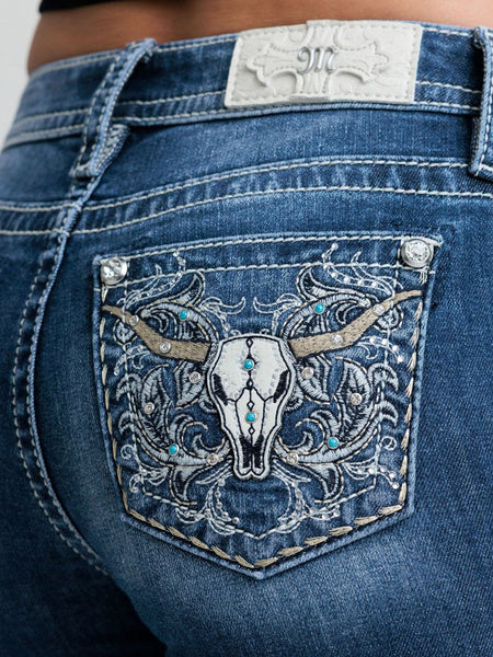 Miss Me M9707BL Womens Mid Rise Bootcut Jean Dark Blue back close up. If you need any assistance with this item or the purchase of this item please call us at five six one seven four eight eight eight zero one Monday through Saturday 10:00a.m EST to 8:00 p.m EST
