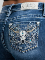 Miss Me M9707BL Womens Mid Rise Bootcut Jean Dark Blue back close up. If you need any assistance with this item or the purchase of this item please call us at five six one seven four eight eight eight zero one Monday through Saturday 10:00a.m EST to 8:00 p.m EST
