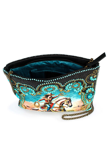 Mary Frances BAG S002-515 COWGIRL Crossbody Handbag Turquoise inside view. If you need any assistance with this item or the purchase of this item please call us at five six one seven four eight eight eight zero one Monday through Saturday 10:00a.m EST to 8:00 p.m EST