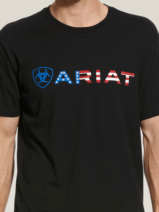 Ariat 10031731 Mens USA Wordmark T-Shirt Black front close up view. If you need any assistance with this item or the purchase of this item please call us at five six one seven four eight eight eight zero one Monday through Saturday 10:00a.m EST to 8:00 p.m EST