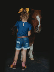Shea Baby SBD02 Kids Denim Lace Shorts Blue back view on model. If you need any assistance with this item or the purchase of this item please call us at five six one seven four eight eight eight zero one Monday through Saturday 10:00a.m EST to 8:00 p.m EST