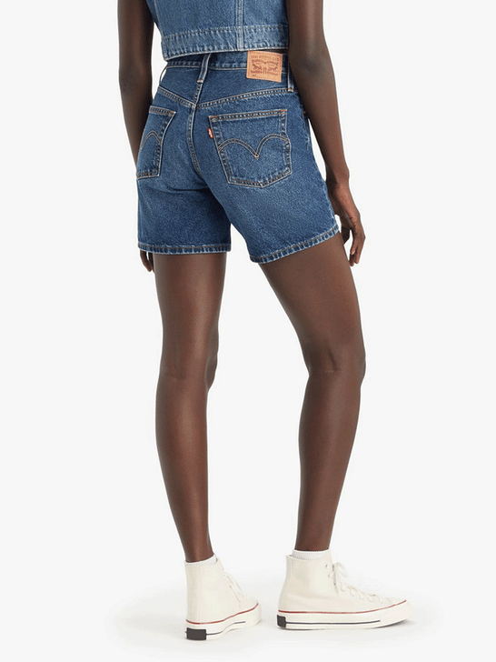 Levi's 858330056 Womens 501 Mid Thigh Denim Shorts Pleased To Meet You Denim back view. If you need any assistance with this item or the purchase of this item please call us at five six one seven four eight eight eight zero one Monday through Saturday 10:00a.m EST to 8:00 p.m EST