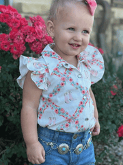 Shea Baby WRSB10 Kids Floral Boot Onesie Shirt With Fringe White front view infant model. If you need any assistance with this item or the purchase of this item please call us at five six one seven four eight eight eight zero one Monday through Saturday 10:00a.m EST to 8:00 p.m EST
