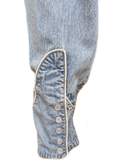 Rockmount 6814-DEN Mens Out of This World Embroidered Denim Western Shirt Light Blue cuff snaps close up. If you need any assistance with this item or the purchase of this item please call us at five six one seven four eight eight eight zero one Monday through Saturday 10:00a.m EST to 8:00 p.m EST


