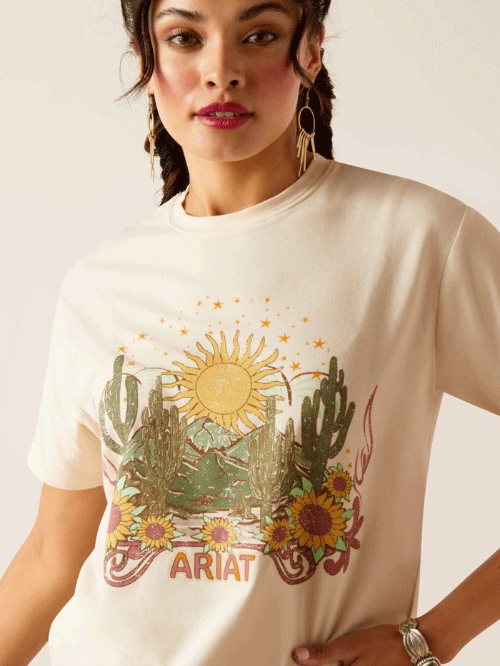 Ariat 10048583 Womens Desert Dreaming T-Shirt Natural front view. If you need any assistance with this item or the purchase of this item please call us at five six one seven four eight eight eight zero one Monday through Saturday 10:00a.m EST to 8:00 p.m EST