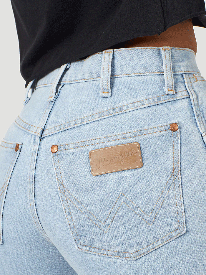 Wrangler 14MWZGH Womens Cowboy Cut Slim Fit Jean Bleach front view. If you need any assistance with this item or the purchase of this item please call us at five six one seven four eight eight eight zero one Monday through Saturday 10:00a.m EST to 8:00 p.m EST