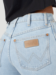 Wrangler 14MWZGH Womens Cowboy Cut Slim Fit Jean Bleach back pocket with patch close up view. If you need any assistance with this item or the purchase of this item please call us at five six one seven four eight eight eight zero one Monday through Saturday 10:00a.m EST to 8:00 p.m EST
