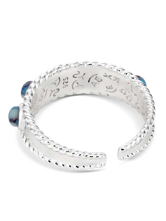 Montana Silversmiths RG6216 Womens Pebbled Wrap Ring Silver And Turquoise front view. If you need any assistance with this item or the purchase of this item please call us at five six one seven four eight eight eight zero one Monday through Saturday 10:00a.m EST to 8:00 p.m EST