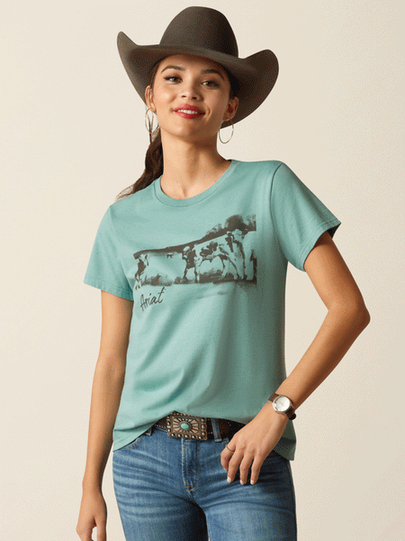 Ariat 10052546 Womens Wholesome Heffers Tee Ocean Blue Heather front view. If you need any assistance with this item or the purchase of this item please call us at five six one seven four eight eight eight zero one Monday through Saturday 10:00a.m EST to 8:00 p.m EST