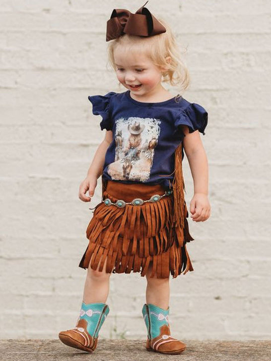 Shea Baby VINB05 Kids Blame It On My Boots Fringe Onesie Navy front view on model.  If you need any assistance with this item or the purchase of this item please call us at five six one seven four eight eight eight zero one Monday through Saturday 10:00a.m EST to 8:00 p.m EST