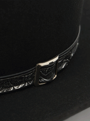 Stetson SBRVGR-463407 Revenger 4X Cowboy Hat Black buckle close up view. If you need any assistance with this item or the purchase of this item please call us at five six one seven four eight eight eight zero one Monday through Saturday 10:00a.m EST to 8:00 p.m EST